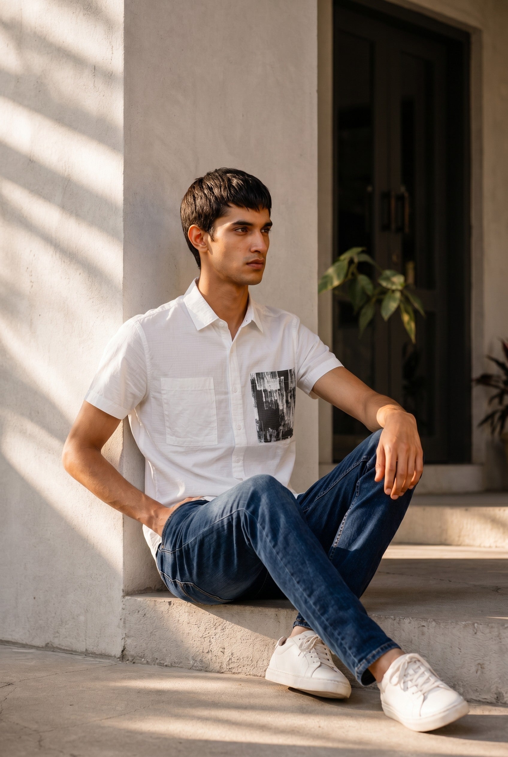 White Short-Sleeve Shirt With A Black And White Graphic Patch Pocket
