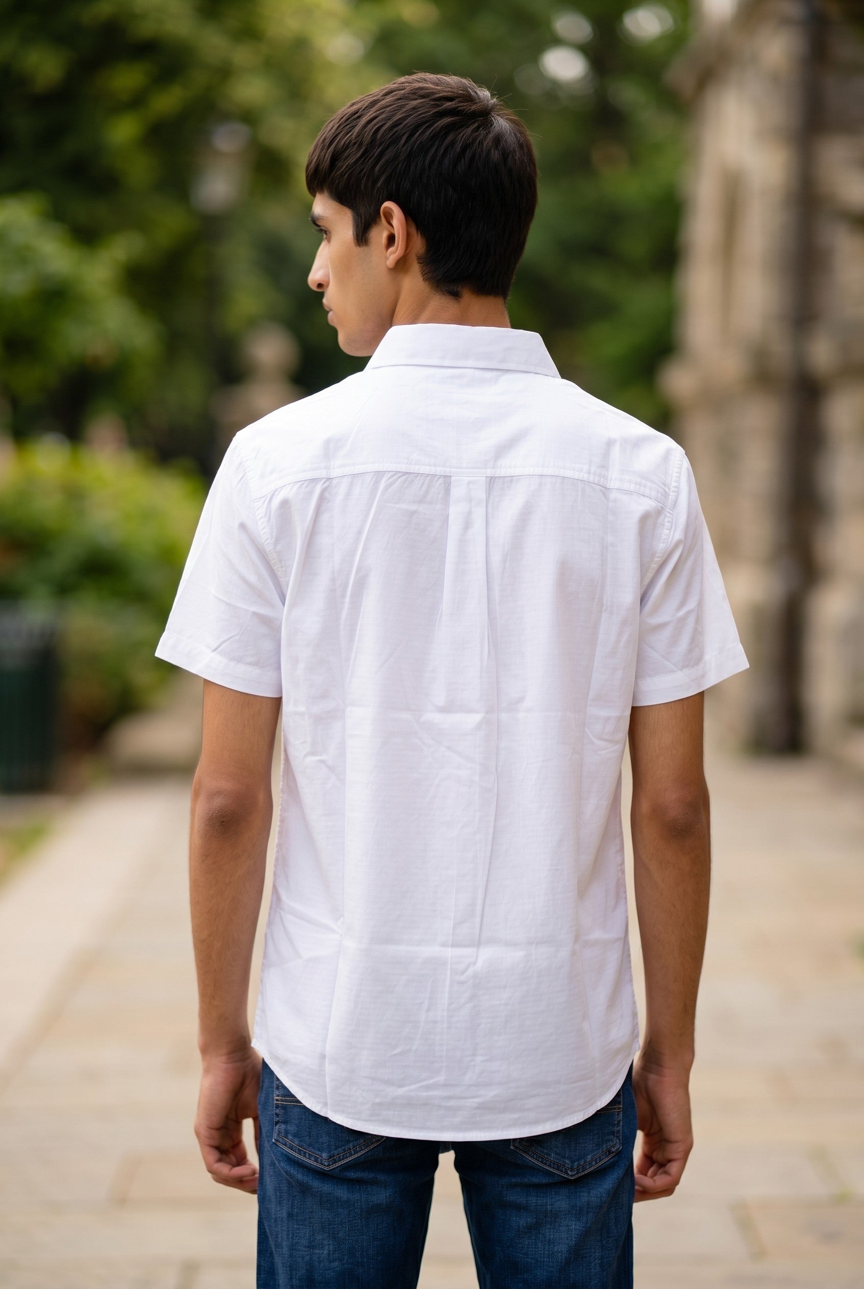 White Short-Sleeve Shirt With A Black And White Graphic Patch Pocket